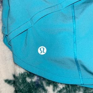 Electric turquoise speed ups size 0